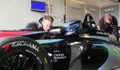 Discussing track conditions and braking points before a practice session starts