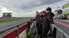 On the pit wall, watching the drivers' lines